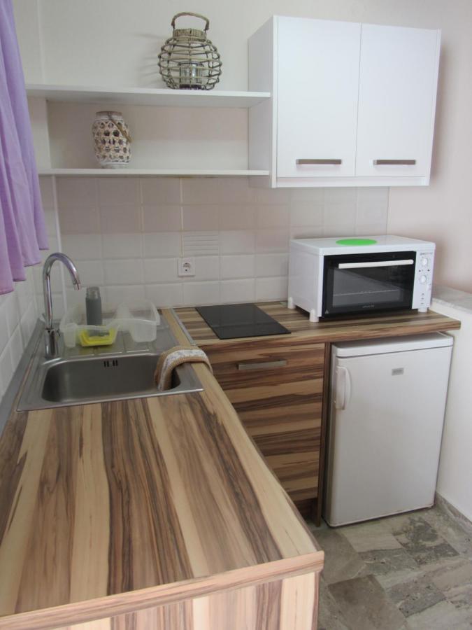 Biscoutsis Apartments & Studios Kavos Bagian luar foto